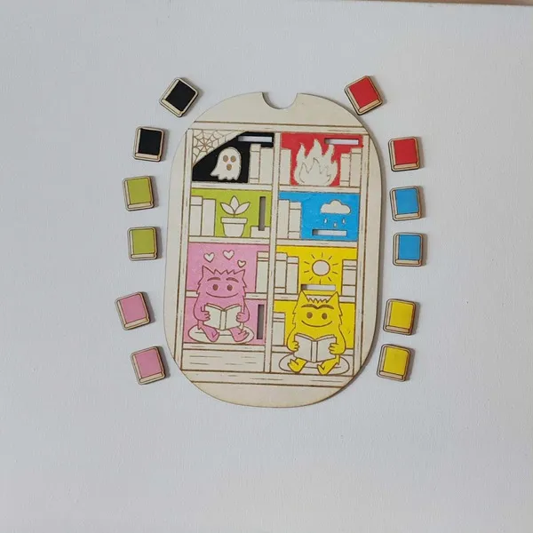 Jeu éducatif en bois “Bibliothèque des émotions” avec monstres colorés et livres assortis
