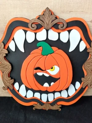 Cadre décoratif Croc’Citrouille en bois avec citrouille orange et grande bouche