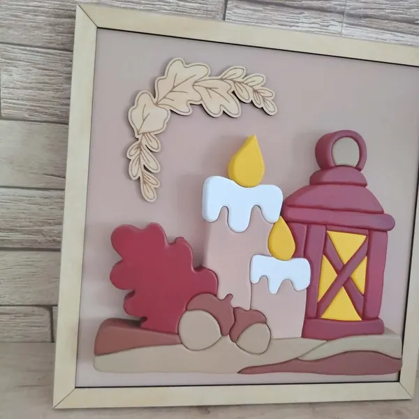 Cadre décoratif automnal en bois avec bougies, lanterne et feuille de chêne