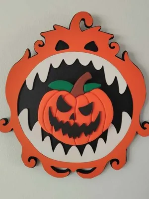 Décoration murale Halloween en bois avec citrouille effrayante en relief