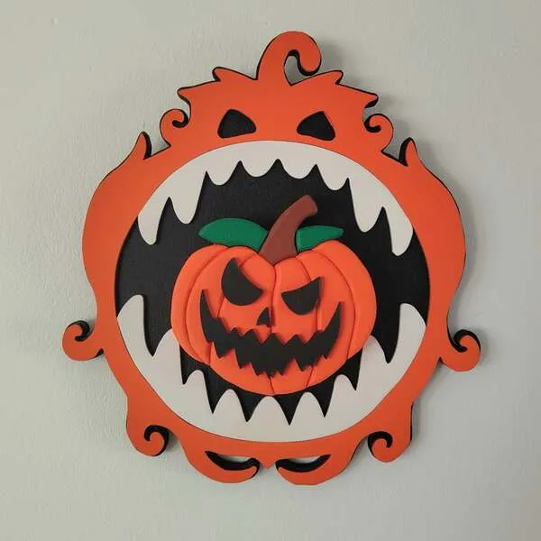 Décoration murale Halloween en bois avec citrouille effrayante en relief